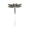 Metal dragonfly sculpture mounted on a slim pole against a white background, viewed front-on.