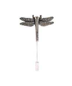 Metal dragonfly sculpture mounted on a slim pole against a white background, viewed front-on.