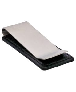 Close-up of a single shiny metal staple resting on a dark surface, angled diagonally across the frame.
