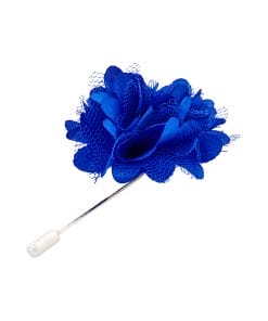 Blue fabric flower boutonniere on a slender stem against a white background, close-up detail of mesh petals.